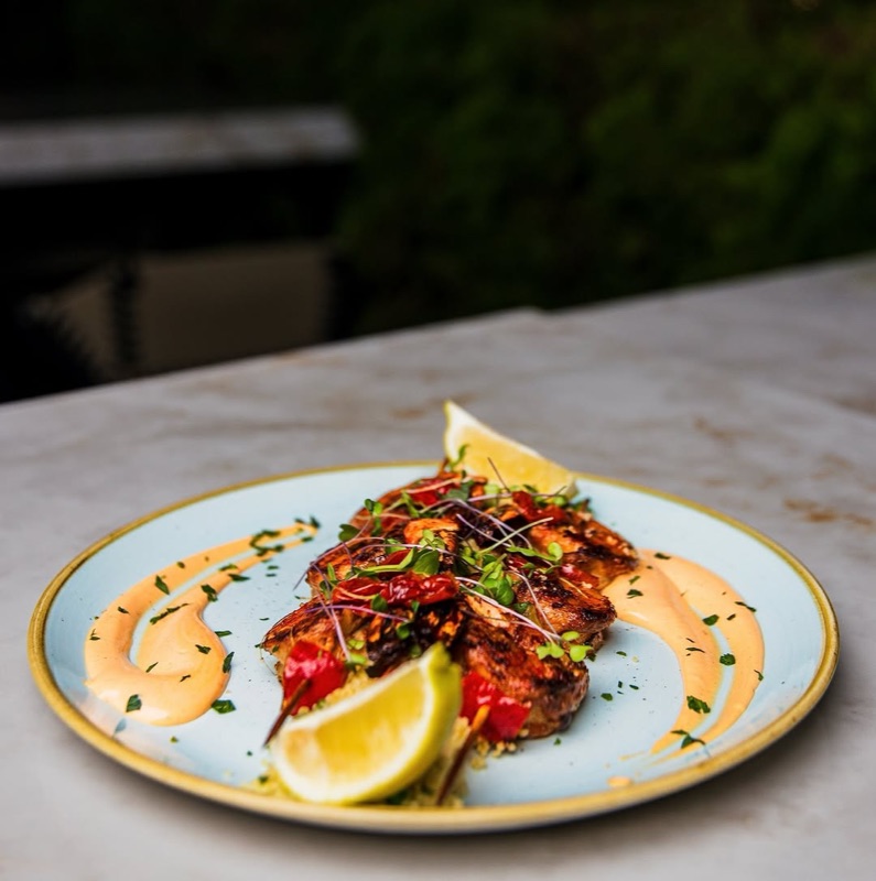 Skybar 25 rooftop bar with Accra city views at sunset in Airport City