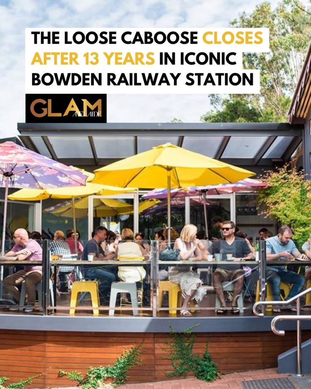 Loose Caboose outdoor terrace with colorful umbrellas in converted railway station setting in Bowden, Adelaide