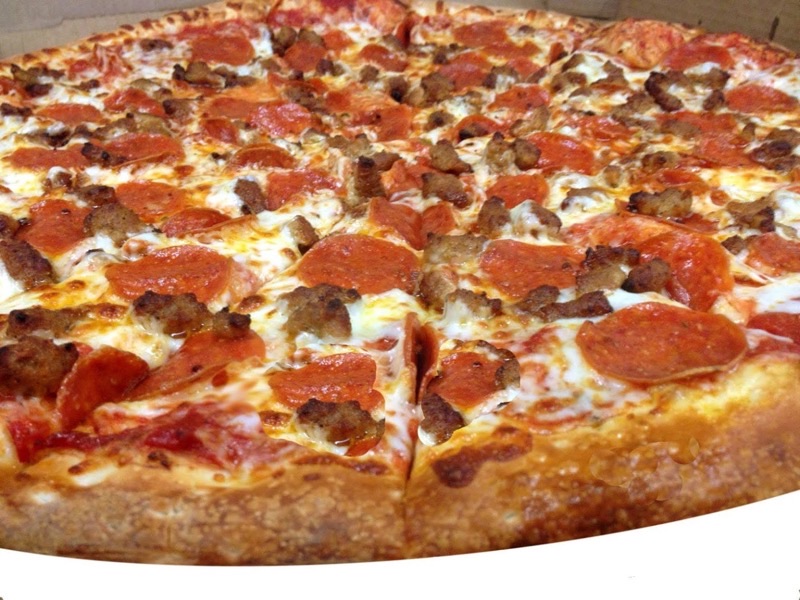 Amadeo's Pizza and Wings in Northeast Heights — Amadeo's offers a diverse menu of gourmet pizzas alongside highly-rated wings, m