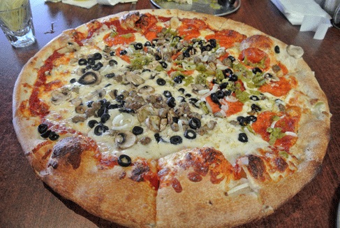 Brickyard Pizza in Nob Hill — Brickyard Pizza offers a creative approach to wood-fired pies with a focus on fr