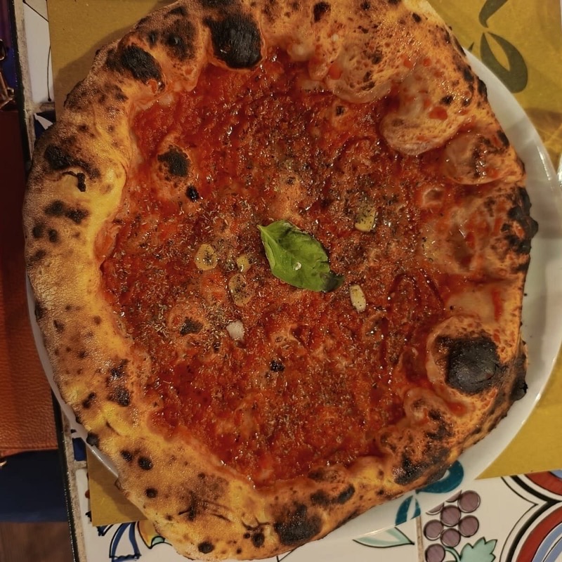 Pizzeria Donna Stella in Central Amalfi — Nestled in a charming lemon-tree garden, Pizzeria Donna Stella offers an authent