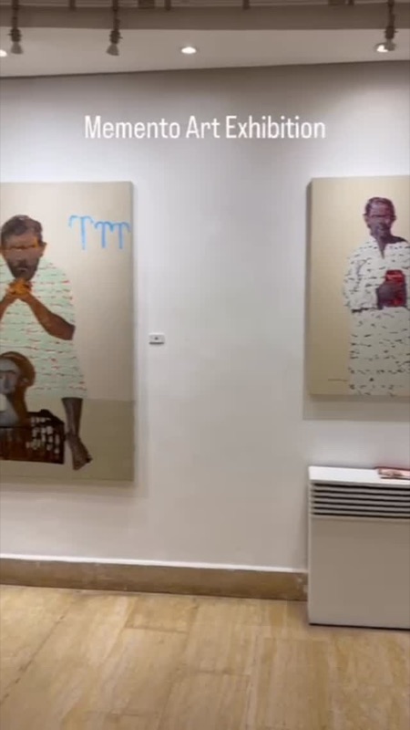 Interior of Memento Art Exhibition at Galerie Orfali with paintings on white walls in Um Uthaina