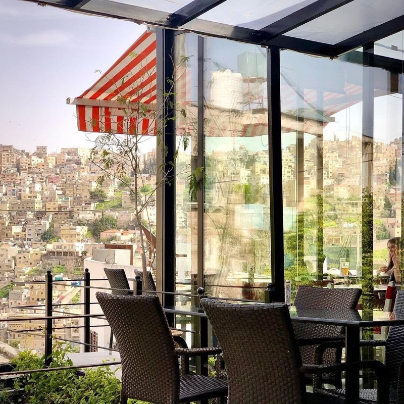 Books@Cafe rooftop terrace with Amman city views on Rainbow Street