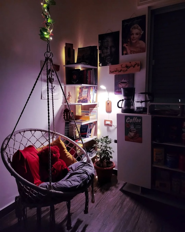 Rumi Cafe bohemian interior with macramé and books in Jabal Luweibdeh, Amman