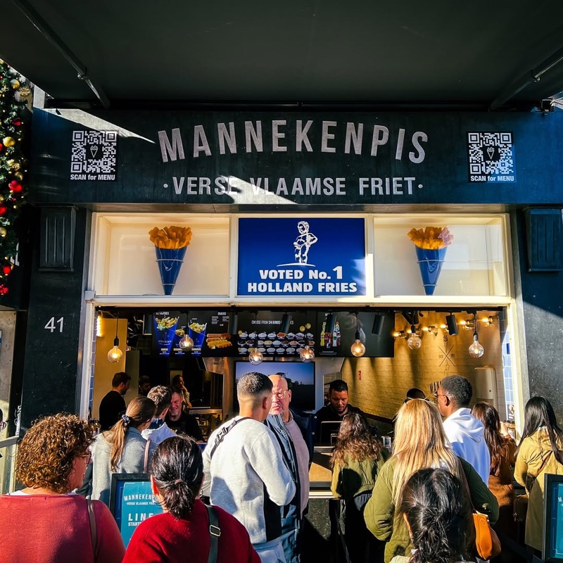 Manneken Pis frites shop on Damrak, Amsterdam