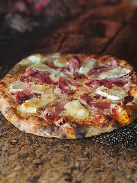 Pizzeria Ombra in West Asheville — Pizzeria Ombra delivers a true taste of Naples with its meticulously crafted Nea
