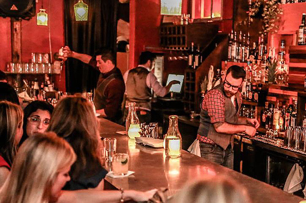 Firehouse Lounge in Downtown — Hidden behind a bookshelf in Austin's oldest fire station hostel, Firehouse Loun