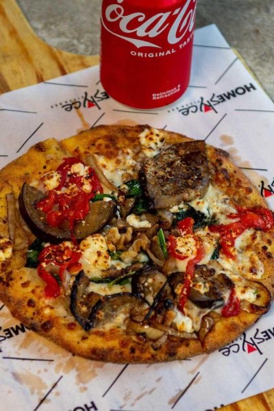 Homeslyce Pizza (Federal Hill) in Federal Hill — Homeslyce is a popular spot for classic New York-style pizza, known for its larg