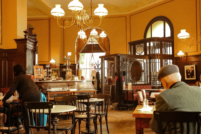 Café Sperl Vienna classic interior with billiard table and newspaper racks