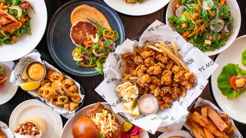 Row 34 in Fort Point — Row 34 offers a sleek, industrial-chic setting with a focus on fresh oysters and