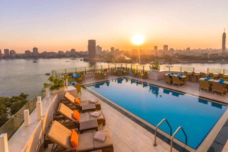 Kempinski Nile Hotel rooftop pool and bar with Nile views