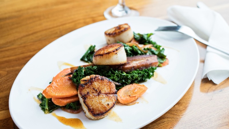 Amen Street Fish & Raw Bar in Historic District — Located in the heart of the historic district, Amen Street offers a lively atmos