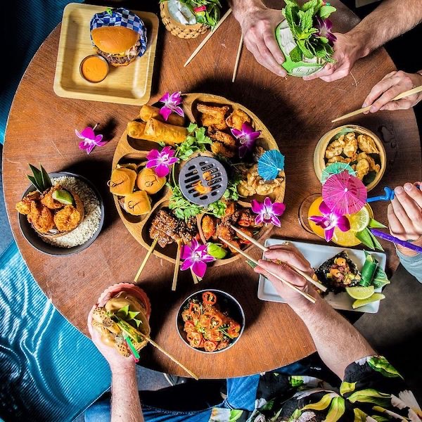 Three Dots and a Dash in River North — Escape to a tropical paradise beneath the streets of River North at this acclaim