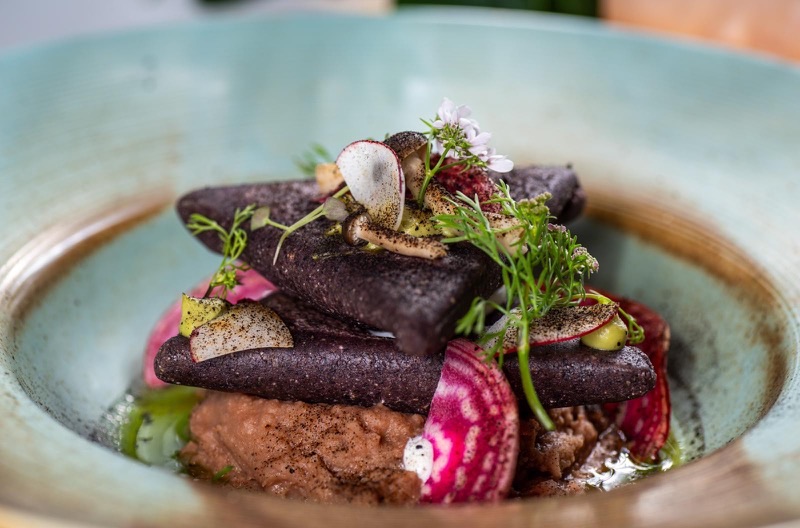 Dark Matter Coffee in Ukrainian Village (The Mothership) — Dark Matter Coffee stands out with its bold, artistic branding and adventurous a