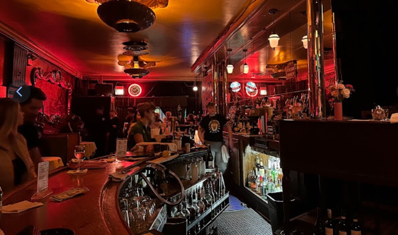 Green Mill Cocktail Lounge in Uptown — A legendary, cash-only Prohibition-era jazz club famed for its continuous live m