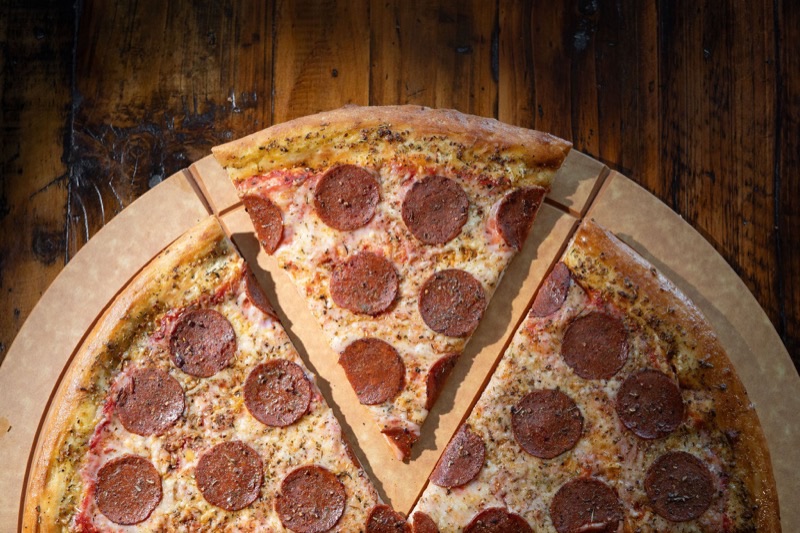 Mikey's Late Night Slice in Downtown — Mikey's is the undisputed king of late-night pizza in Columbus, offering massive