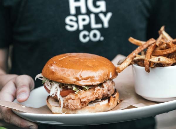 HG Sply Co. in Lower Greenville — HG Sply Co. offers a dynamic rooftop experience with stunning views of the Dalla