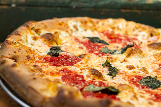 Olivella's Neo Pizza Napoletana in multiple locations, e.g., University Park — Olivella's offers award-winning Neapolitan and Roman-style pizzas, providing a d