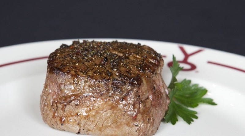 Y.O. Ranch Steakhouse in West End — Embrace the spirit of the Old West at Y.O. Ranch Steakhouse, offering an authent