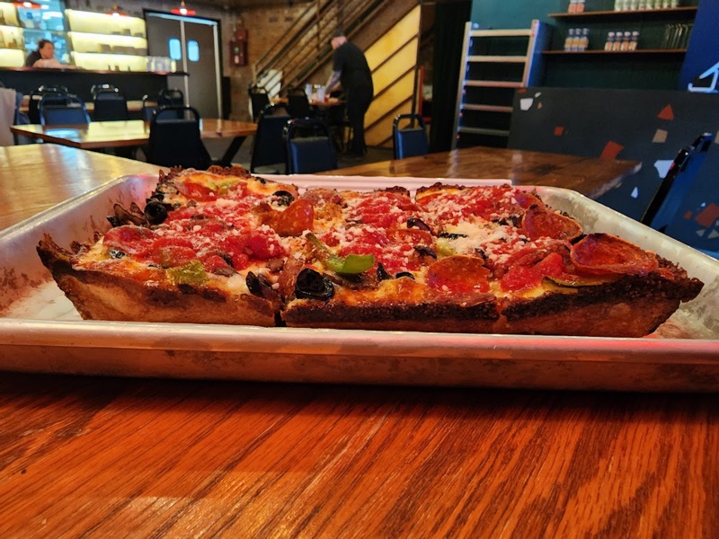 Michigan & Trumbull in New Center Detroit — modern Detroit-style pizza