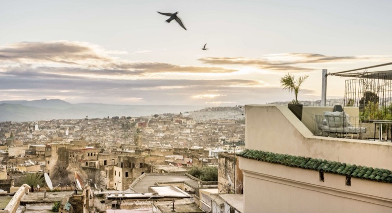 Riad Fes L'Ambre luxury rooftop terrace with panoramic medina views