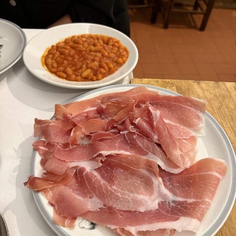 Il Latini in Santa Maria Novella — Il Latini embodies rustic Tuscan charm with its long communal tables, handwritte