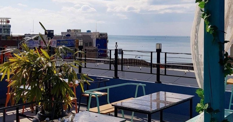 Maison Côté rooftop café on Dalmaji Hill with ocean view