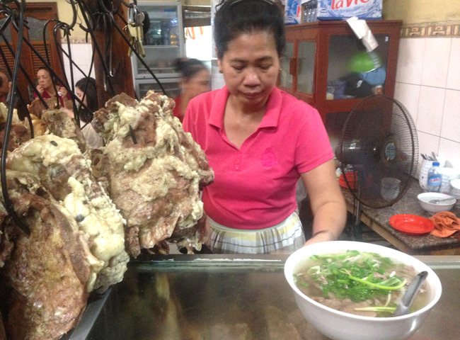Pho Gia Truyen Bat Dan in Old Quarter — A legendary pho spot where locals and tourists queue up daily for a taste of aut
