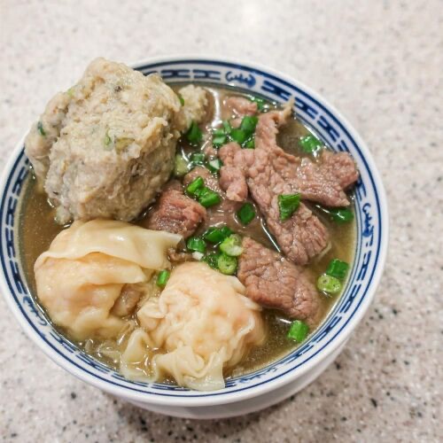 Tsim Chai Kee Noodle in Central — A Michelin-recommended spot known for its generous portions and excellent value.