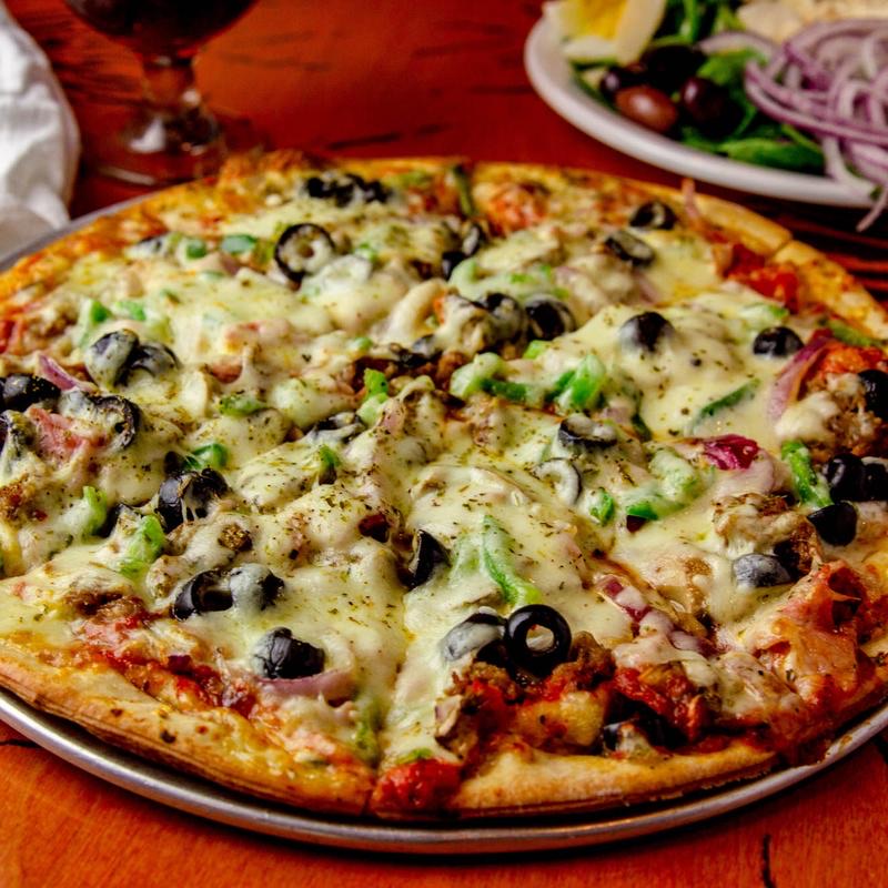 Bazbeaux Pizza in Mass Ave / Broad Ripple — An Indianapolis staple since 1986, Bazbeaux is celebrated for its gourmet thin-c