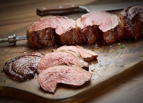 Fogo de Chão Brazilian Steakhouse in Downtown — Experience the churrascaria tradition at Fogo de Chão, where Gaucho chefs contin