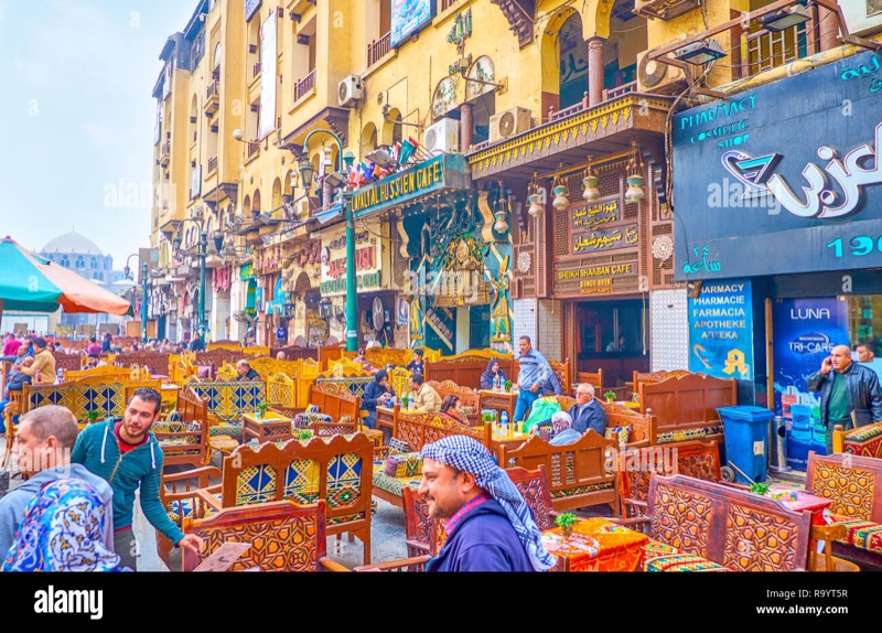 Traditional ahwa café on Al-Hussein Square facing the mosque