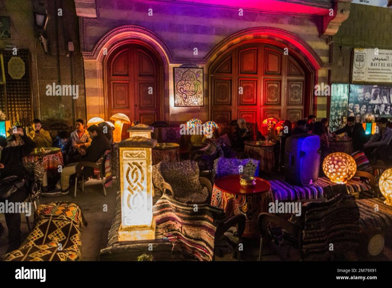 Coffeehouses along Al-Muizz Street with medieval Islamic architecture