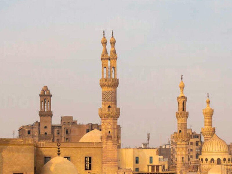 Bein El Qasreen café near medieval minarets in Islamic Cairo