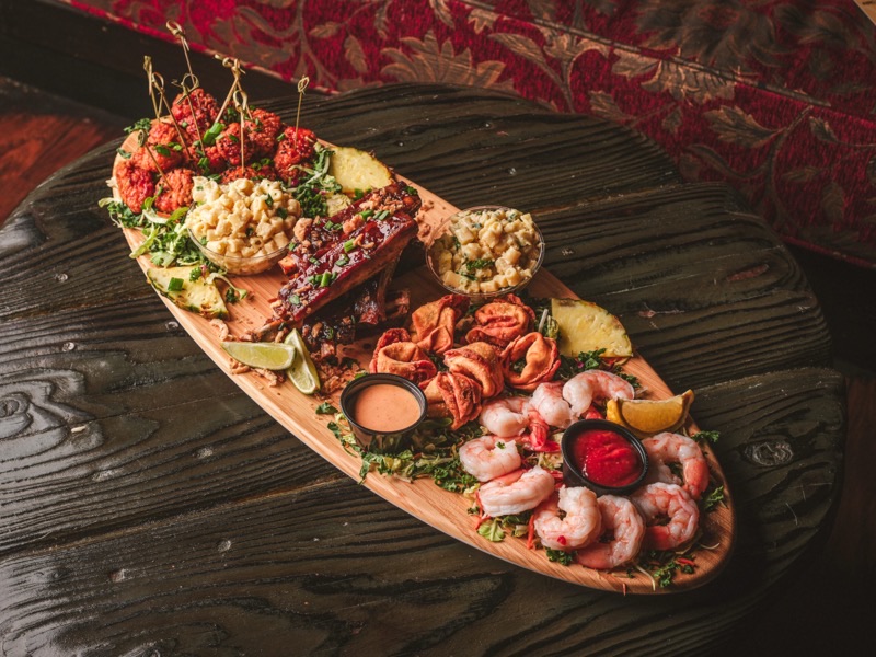 Golden Tiki in Chinatown — Step into a whimsical world at The Golden Tiki, an immersive bar offering a fant