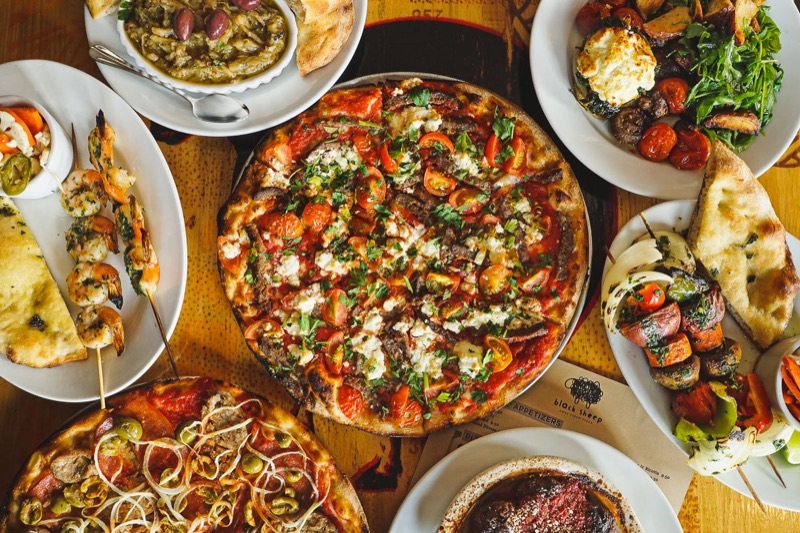 Black Sheep Pizza in North Loop — Black Sheep Pizza offers a distinct coal-fired experience, resulting in a thin, 