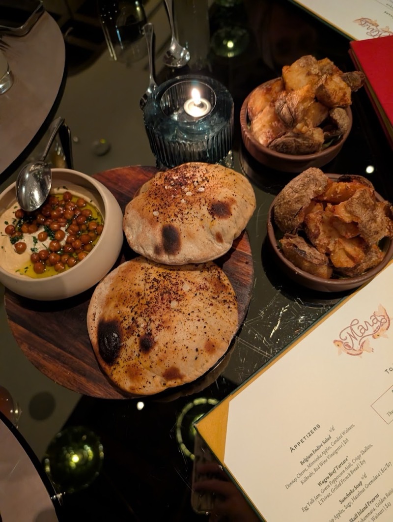 The Parlour (Mara Restaurant) in North Loop — Part of the upscale Mara Restaurant within the Four Seasons, The Parlour offers 