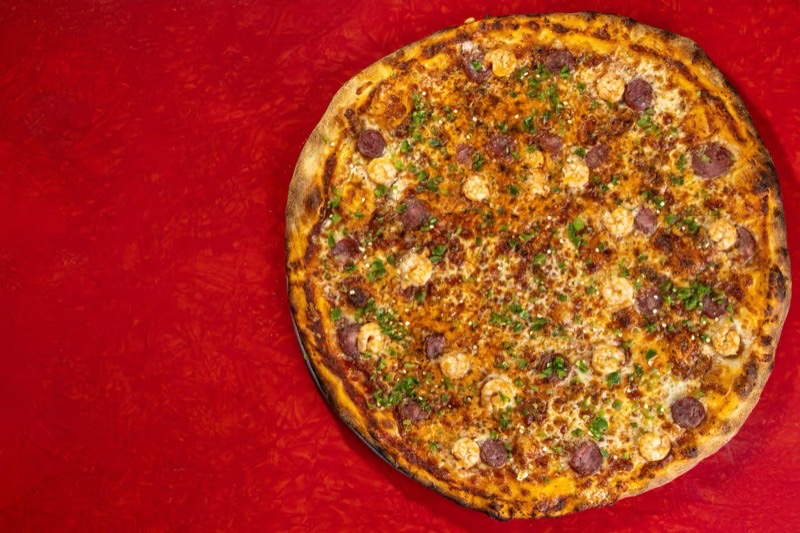 Two Boots Nashville in East Nashville — Two Boots brings its unique Cajun-Italian fusion pizzas to Nashville, offering b