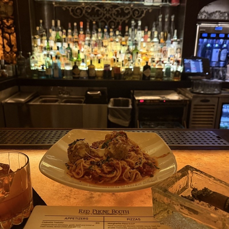 Red Phone Booth in Downtown — Step back into the 1920s with Red Phone Booth, a true speakeasy requiring a pass