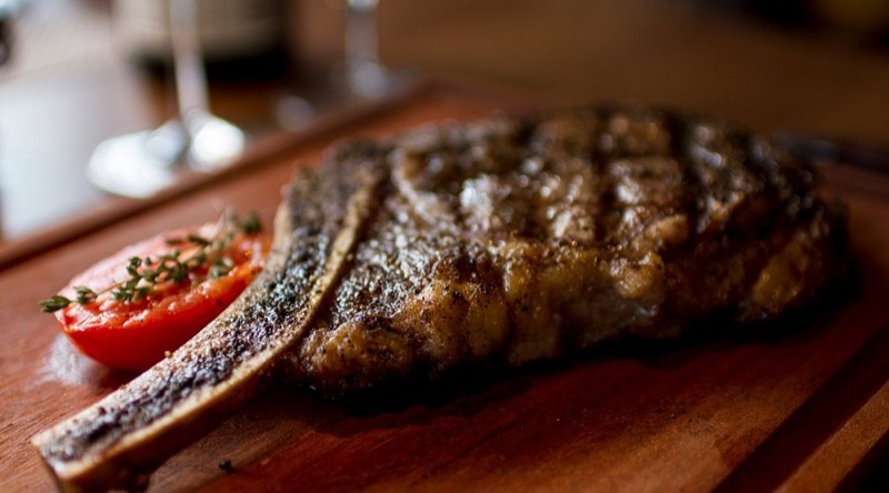 Oak Steakhouse in West End — Oak Steakhouse, originally from Charleston, brings a sophisticated yet approacha