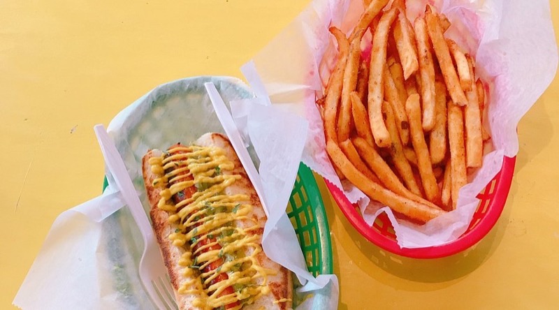 Dat Dog (Frenchmen St) in Faubourg Marigny — Dat Dog offers a fun, vibrant atmosphere with a huge selection of gourmet hot do