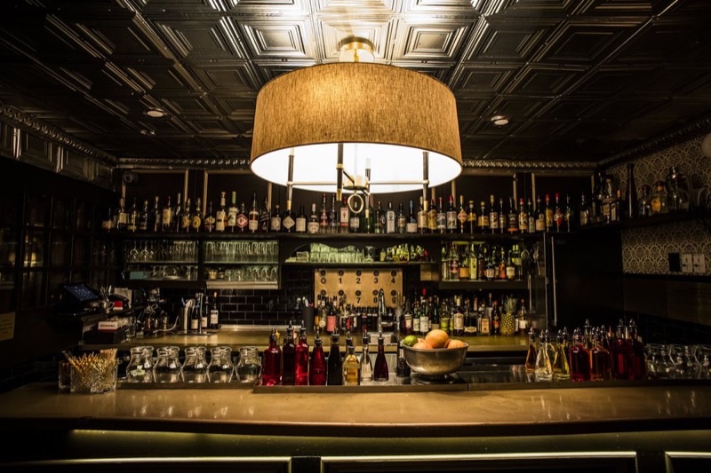 Raines Law Room (Chelsea) in Chelsea — Behind an unmarked door and down a flight of stairs, Raines Law Room offers an e