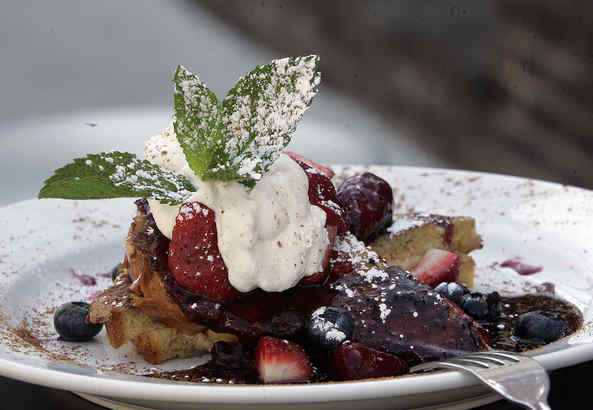 Green Eggs Cafe in Midtown Village — Green Eggs Cafe is known for its energetic ambiance and extensive menu of innova