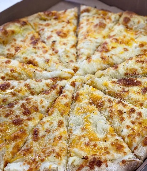 Aiello's Pizza in Squirrel Hill — Often debated as the rival to Mineo's, Aiello's offers another quintessential Pi