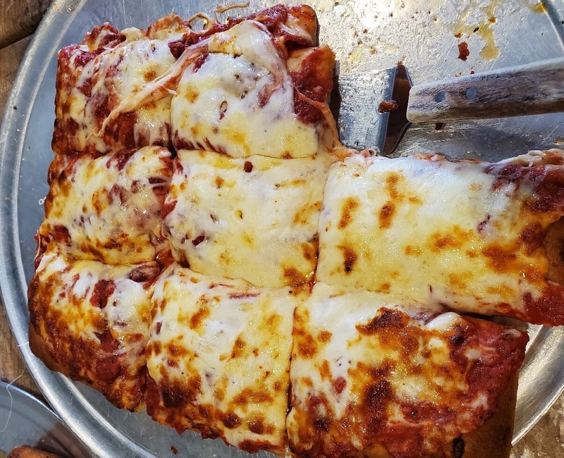 Mineo's Pizza House in Squirrel Hill — A legendary Pittsburgh institution since 1958, Mineo's is synonymous with tradit