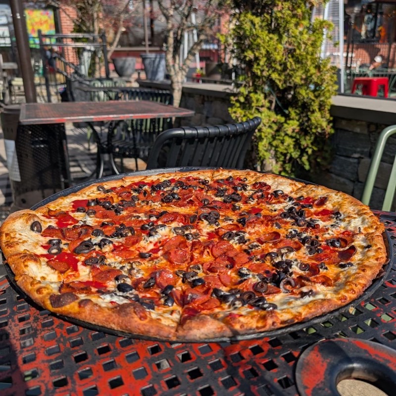 Fellini Pizzeria in Downtown/College Hill — A bustling hotspot popular with college students and late-night crowds, Fellini 