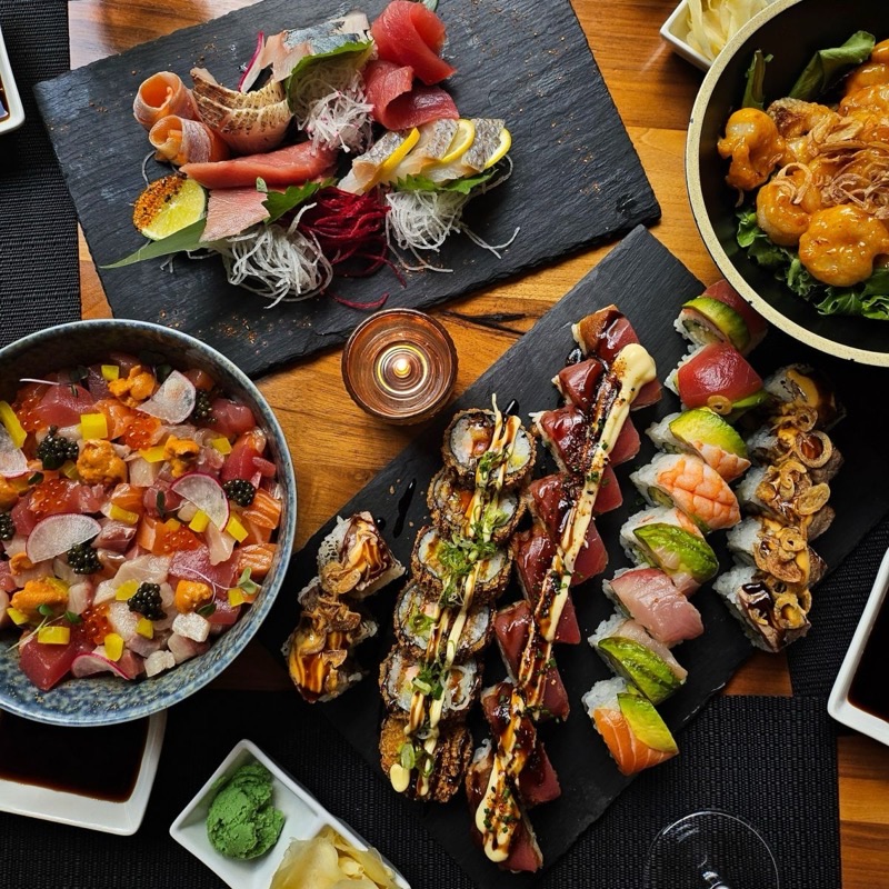 O-Ku Sushi in Downtown Raleigh — O-Ku Sushi elevates the dining experience with its chic, minimalist ambiance and