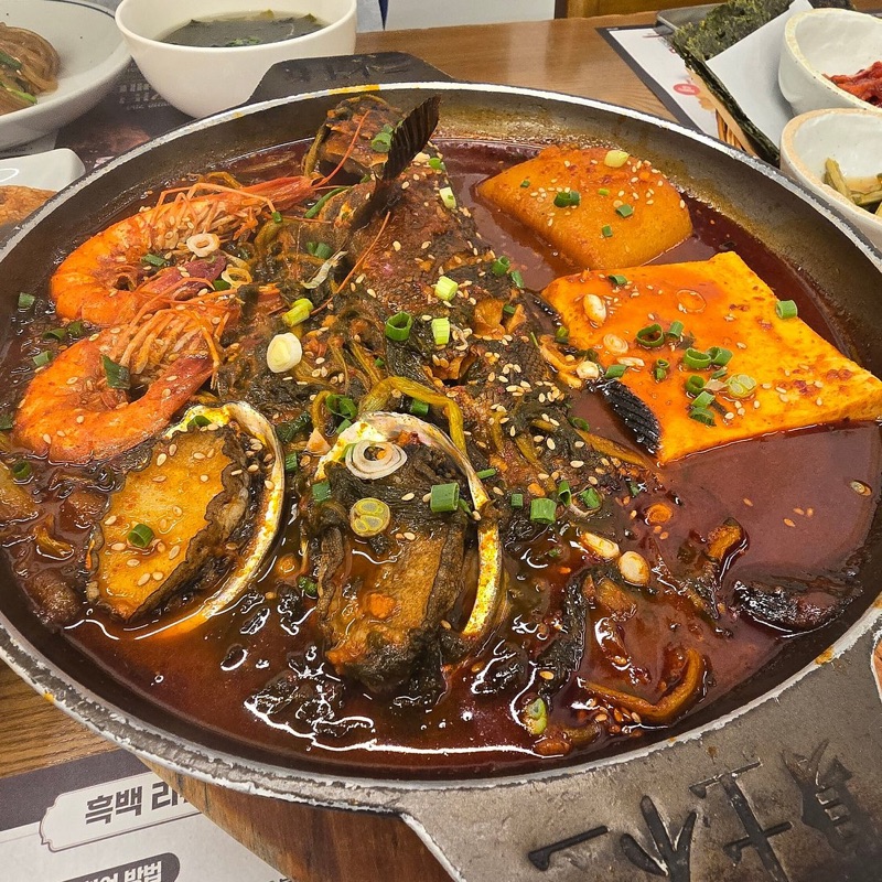 Gozip Dol Wooluck rockfish stew and sashimi in Seogwipo, Jeju