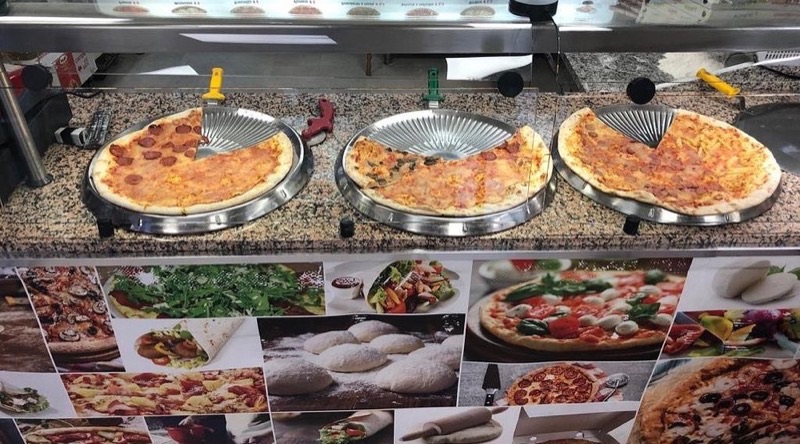 Pizzeria Peter Pan in Near Siena Station — Pizzeria Peter Pan is a beloved local spot, especially popular with families, of