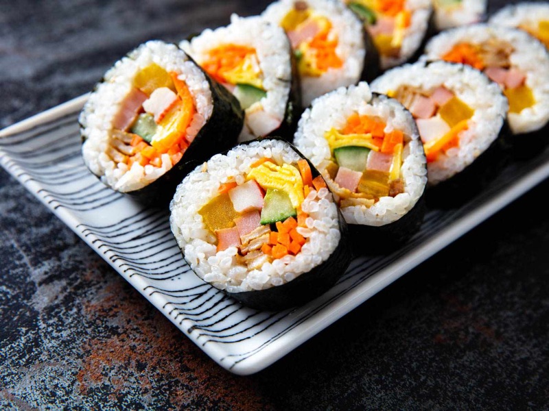 Gimbap Korean rice rolls sliced showing colorful fillings